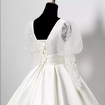 Juliette Sleeve Sheer Deep Neck Satin Cathedral Train Wedding Dress